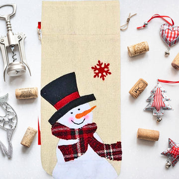 ŚWIĄTECZNY POKROWIEC NA BUTELKĘ ETUI WOREK JUTOWY na WINO UBRANKO BAŁWANEK